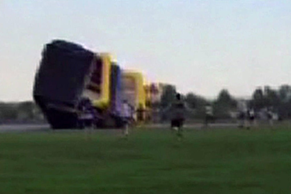 The bouncy castle is tossed across a field in Colorado.