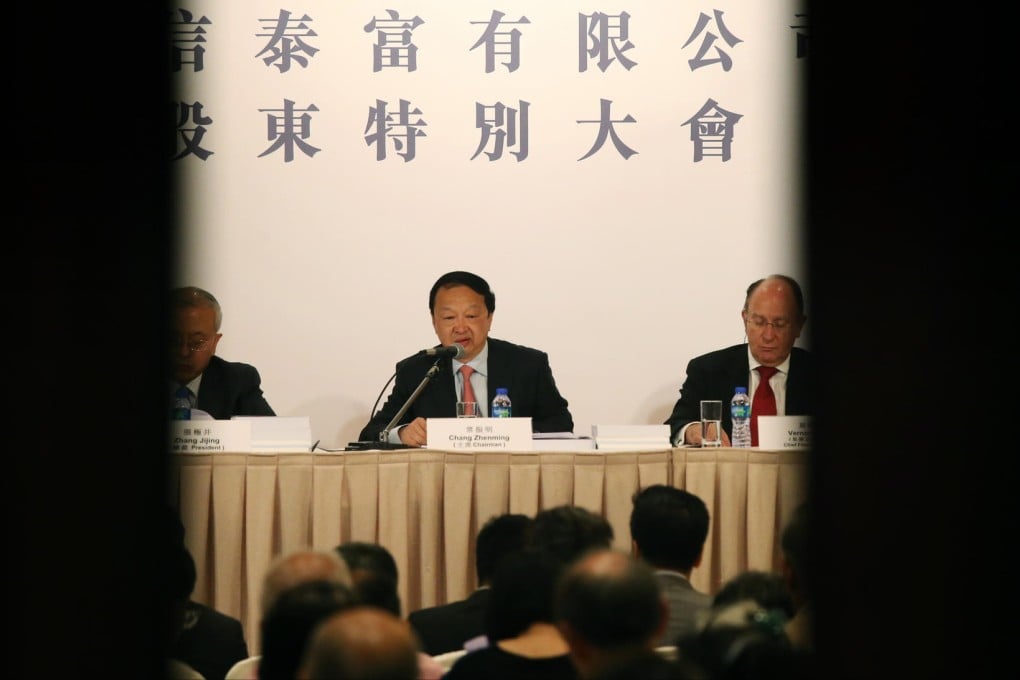Citic chairman Chang Zhenming (centre), with company president Zhang Jijing and chief financial officer Vernon Moore at the extraordinary meeting yesterday. Photo: K.Y. Cheng