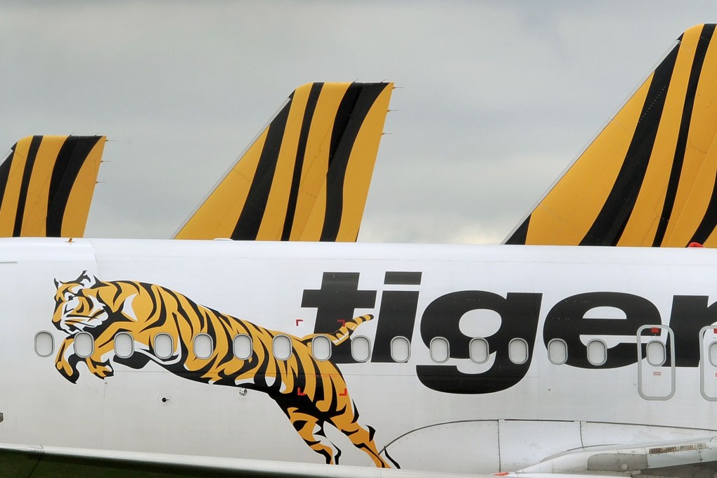 Tiger Air is grounding planes, cancelling aircraft orders and is reviewing its investment in a venture in Indonesia after six consecutive quarters of losses led its largest shareholder Singapore Air to name a new chief executive for the airline. Photo: AFP