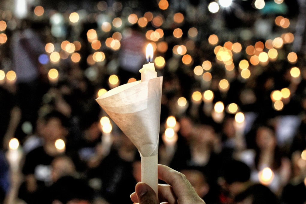 Thousands of citizens attend the candlelight vigil commemorating the anniversary of June 4th Tiananmen Crackdown at Victoria Park.