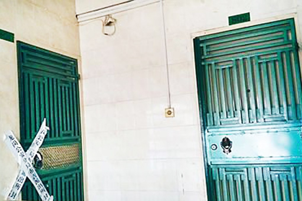 The flat in Buji where Kan allegedly strangled his mistress and two-year-old son.