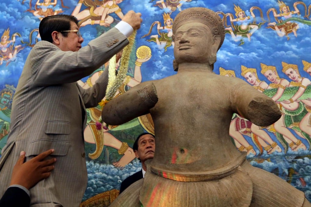 One of the ancient statues is presented in Phnom Penh. Photo: AFP