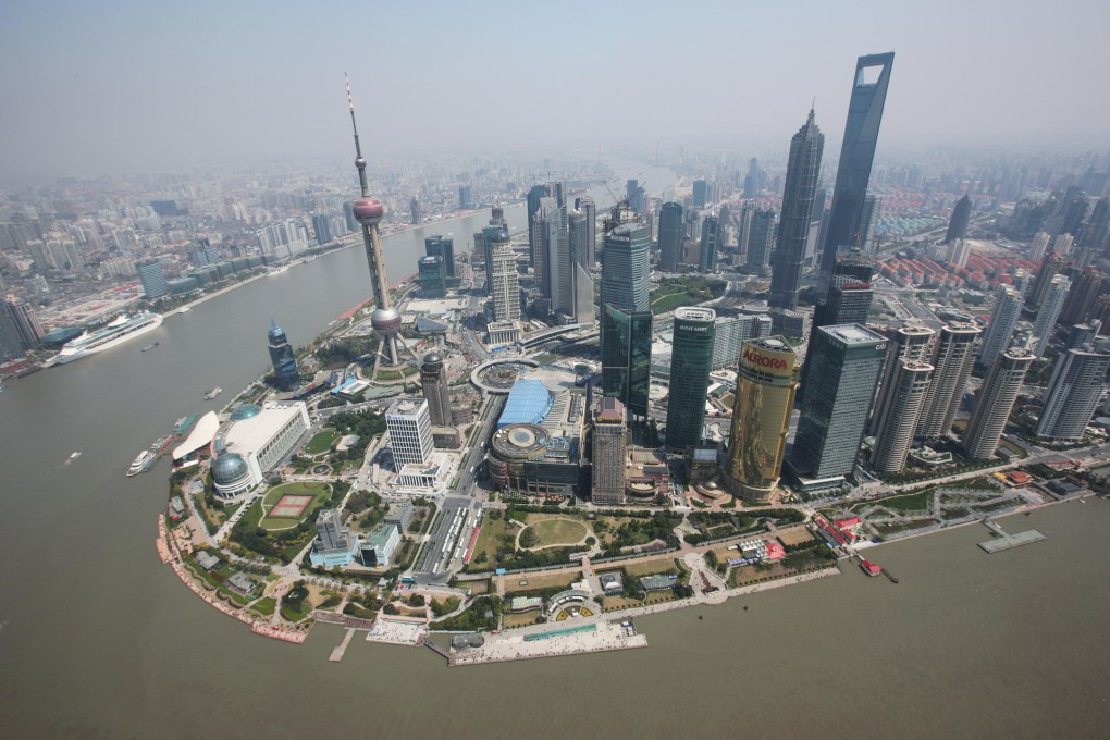While Shanghai's skyline attests to China's economic success, it faces challenges in shifting to a consumption-driven model. Photo: AFP