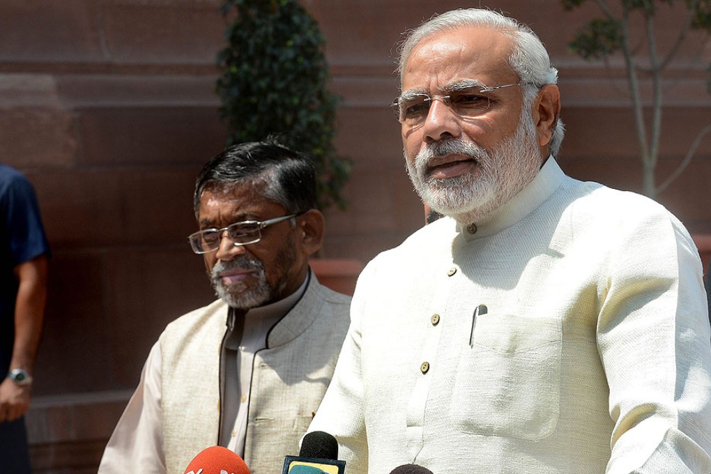 Prime Minister Narendra Modi addresses the media on his arrival for the first session of India's newly elected parliament in New Delhi on Wednesday. Photo: AFP