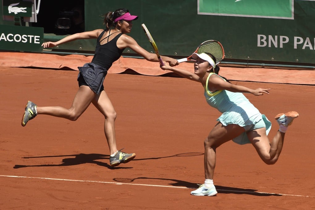 Taiwan's Hsieh Su-wei (left) and China's Peng Shuai show fierce determination on their way to victory in the women's doubles final at the French Open. Photo: AFP