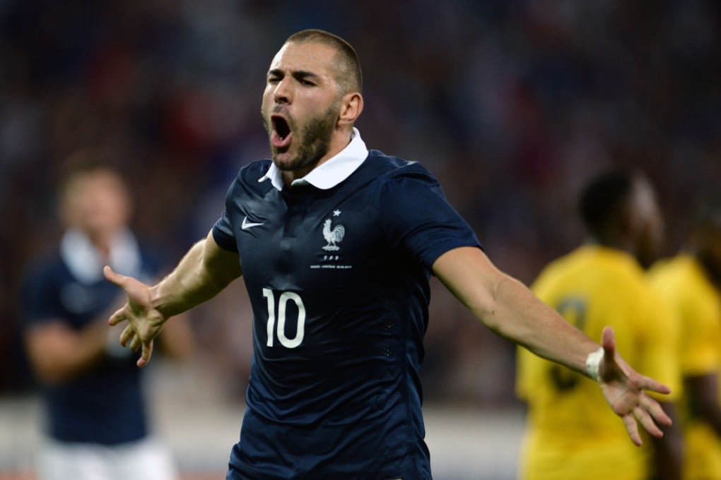 France's Karim Benzema celebrates after scoring during the friendly with  Jamaica. Photo: AFP