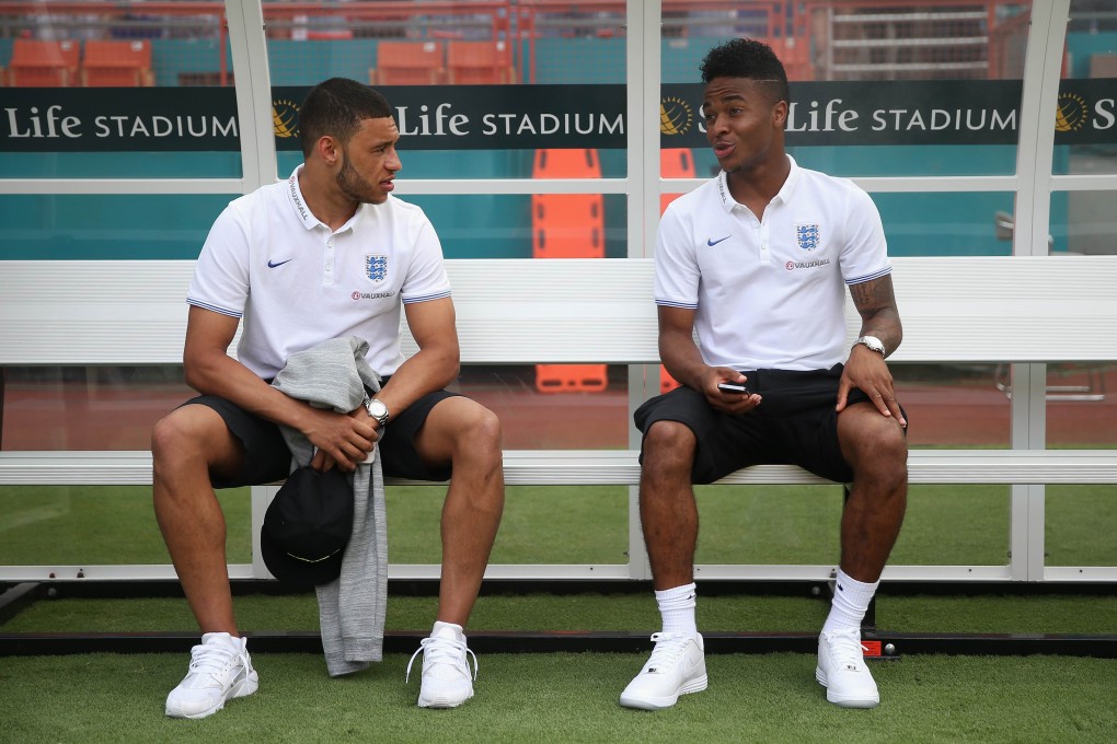 Alex Oxlade-Chamberlain (left) and Raheem Sterling speak prior to England's match with Honduras in Miami. Photo: AFP