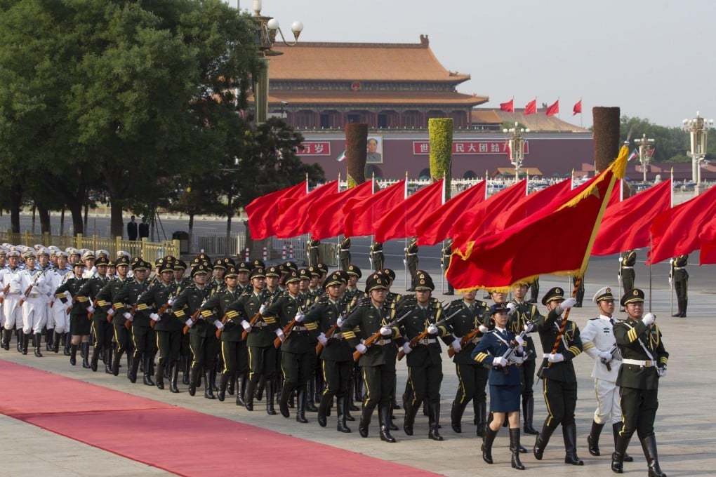 People's Liberation Army honour guards march beside Tiananmen Square the day before the 25th anniversary of June 4. Photo: EPA