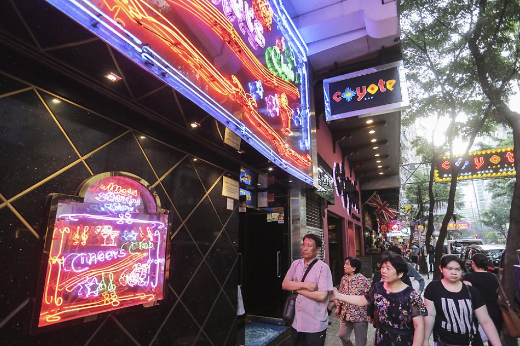 Much of Lockhart Road has retained the grittiness of old Wan Chai. Photo: Paul Yeung