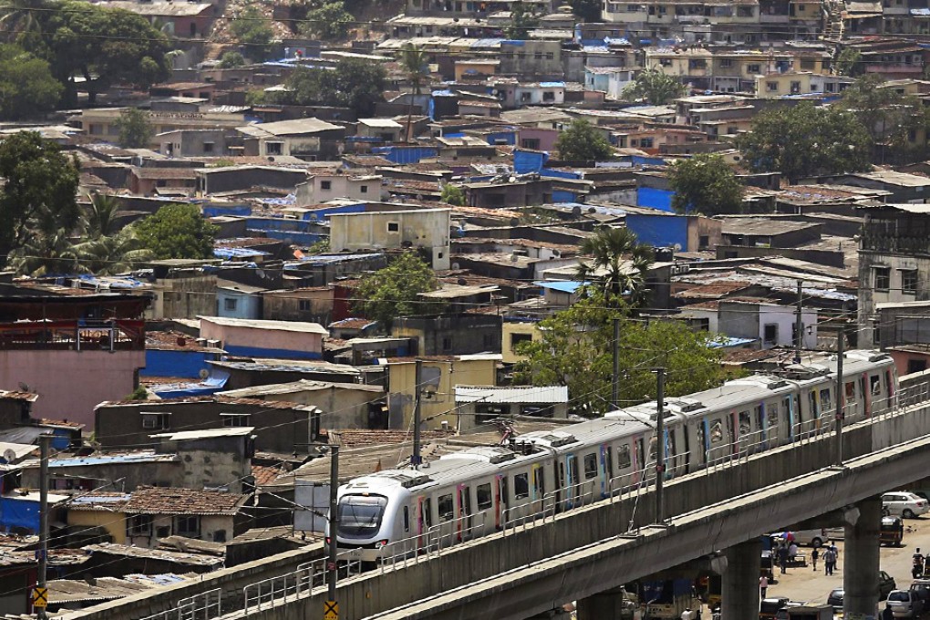 Mumbai's new commuter railway stretches 12km, serves 12 stations and cuts a 90-minute commute across the breadth of the city to 20 minutes. Photo: EPA