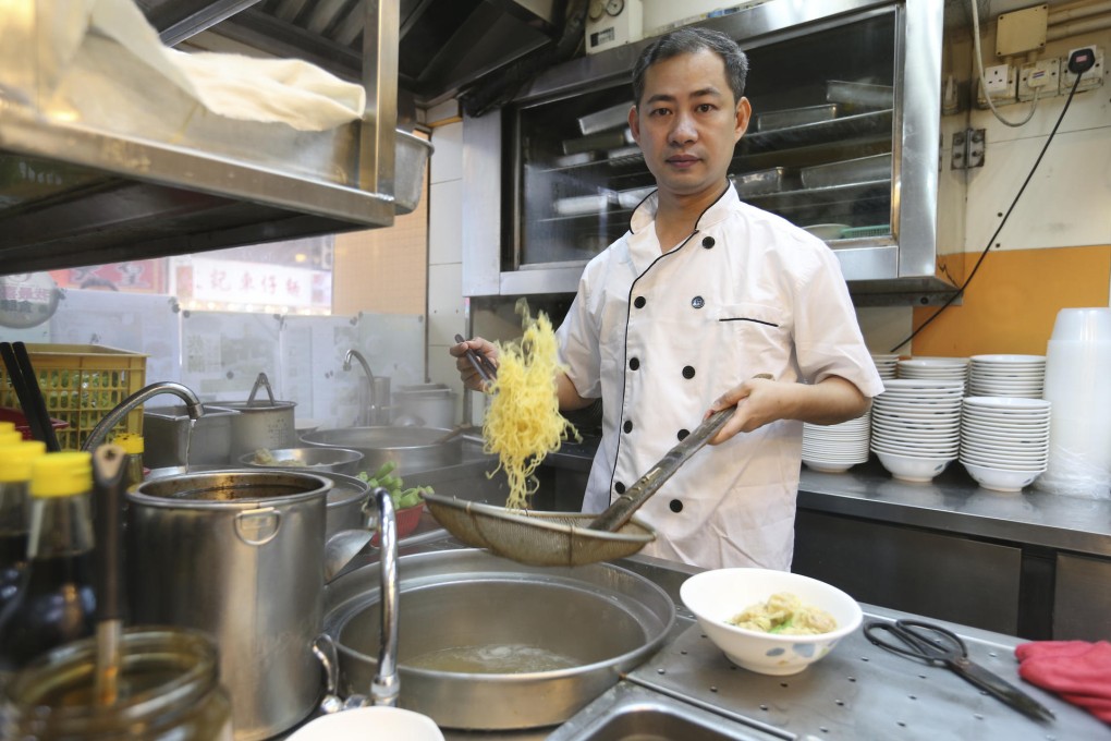 Souped up: Lau Fat-cheong prepares wonton noodles (below). Photos: K.Y. Cheng