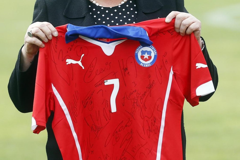 Chilean President Michelle Bachelet backs her team.