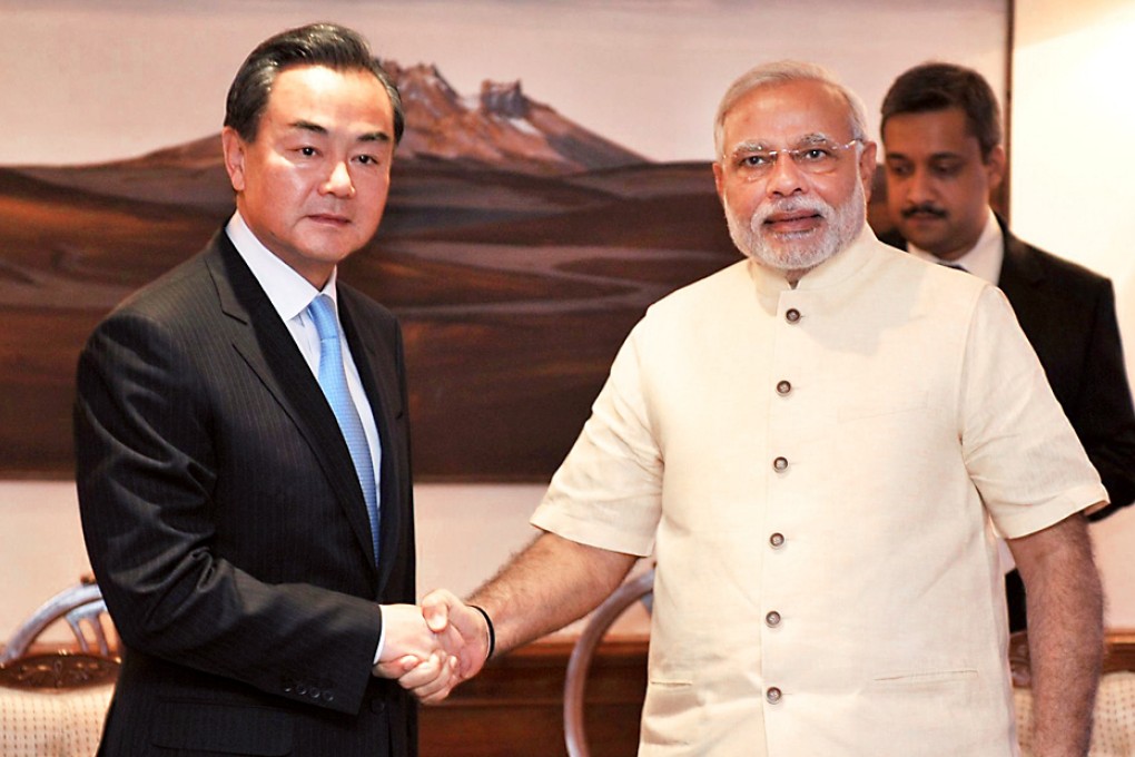 Wang Yi and Narendra Modi meet in New Delhi. Photo: AFP