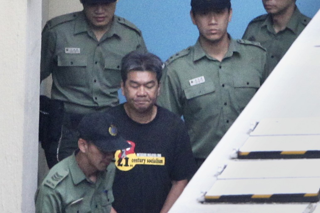 Legislators "Long Hair" Leung Kwok-hung's iconic hair was cut into short hair and was led out by Correctional Services officers at the Lai Chi Kok Correctional Institution officers. Photo: SCMP