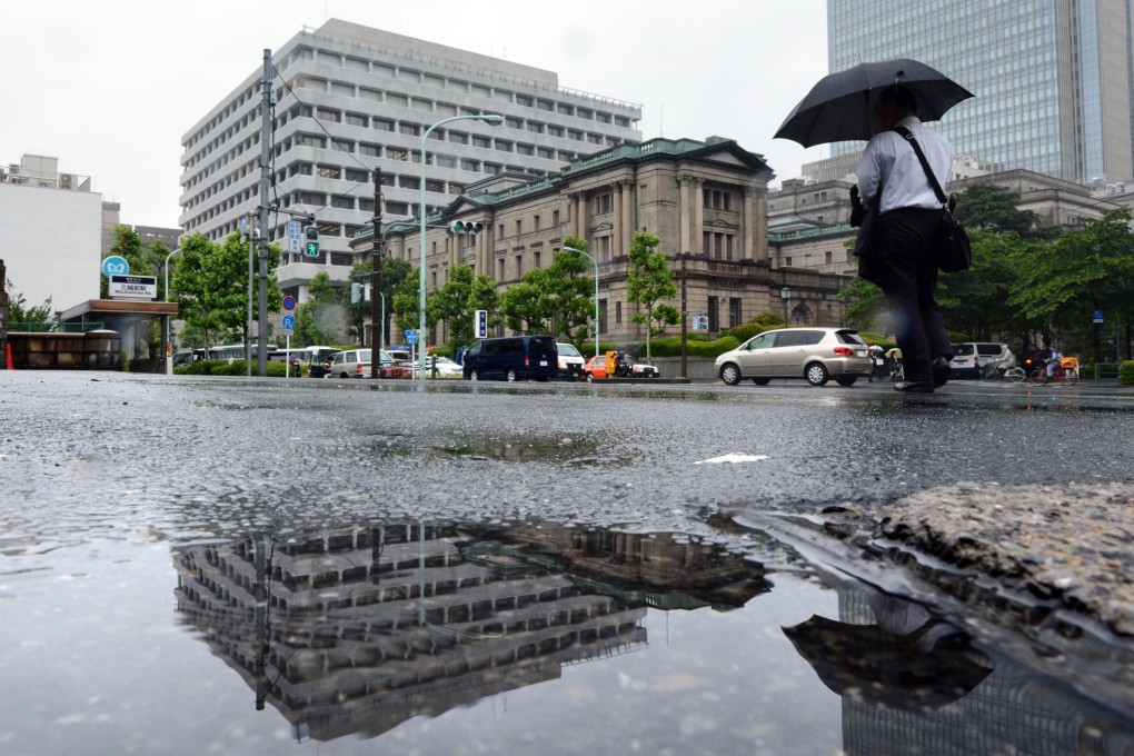 Under the potential strategy, Bank of Japan would use cash from maturing securities in its portfolio to buy long-term government debt. Photo: AFP