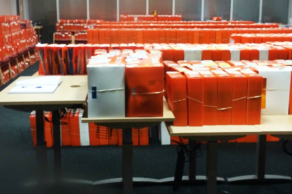 Folders of passport applications waiting to be processed in Liverpool, England. Photo: SCMP Pictures