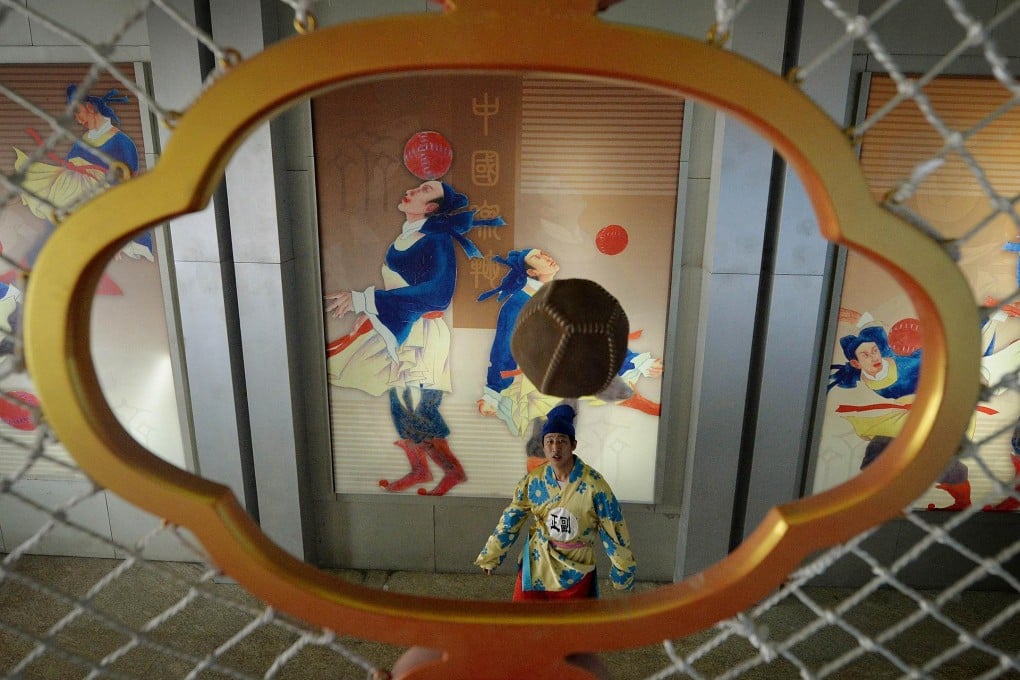 A cuju player shoots for goal at the Linzi museum. Photo: AFP