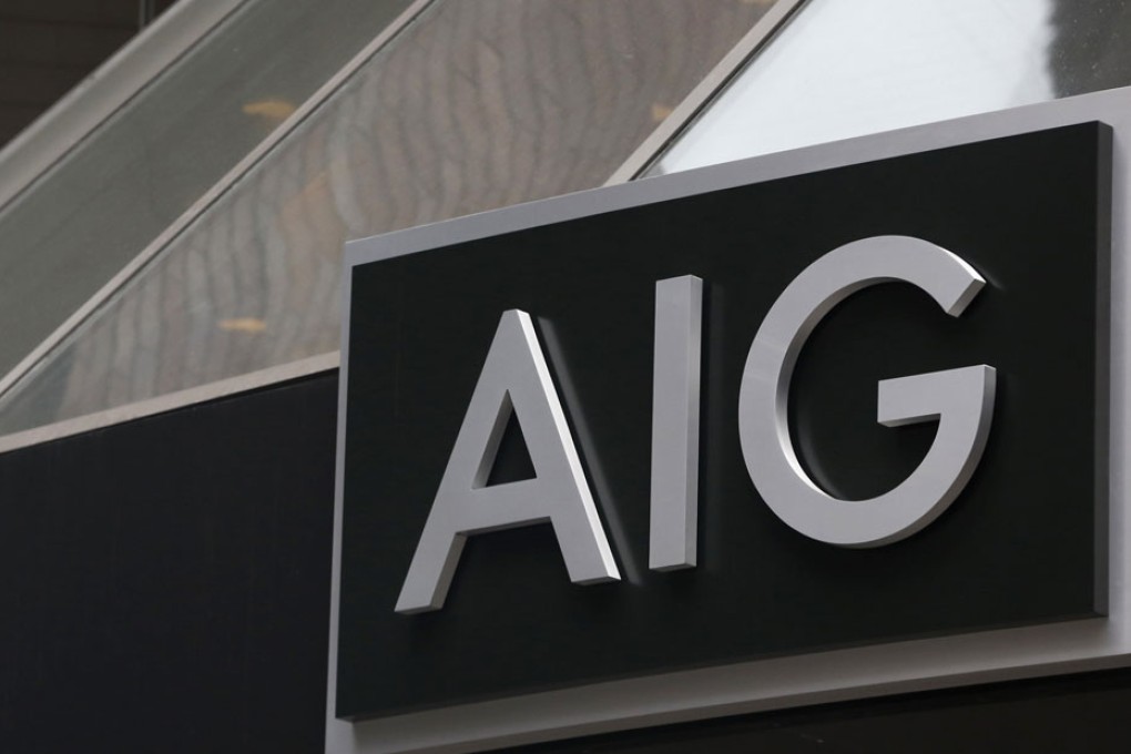 AIG names Peter Hancock as new chief executive.