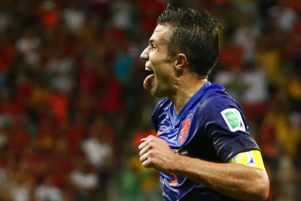 Robin van Persie celebrates his second. Photo: Reuters