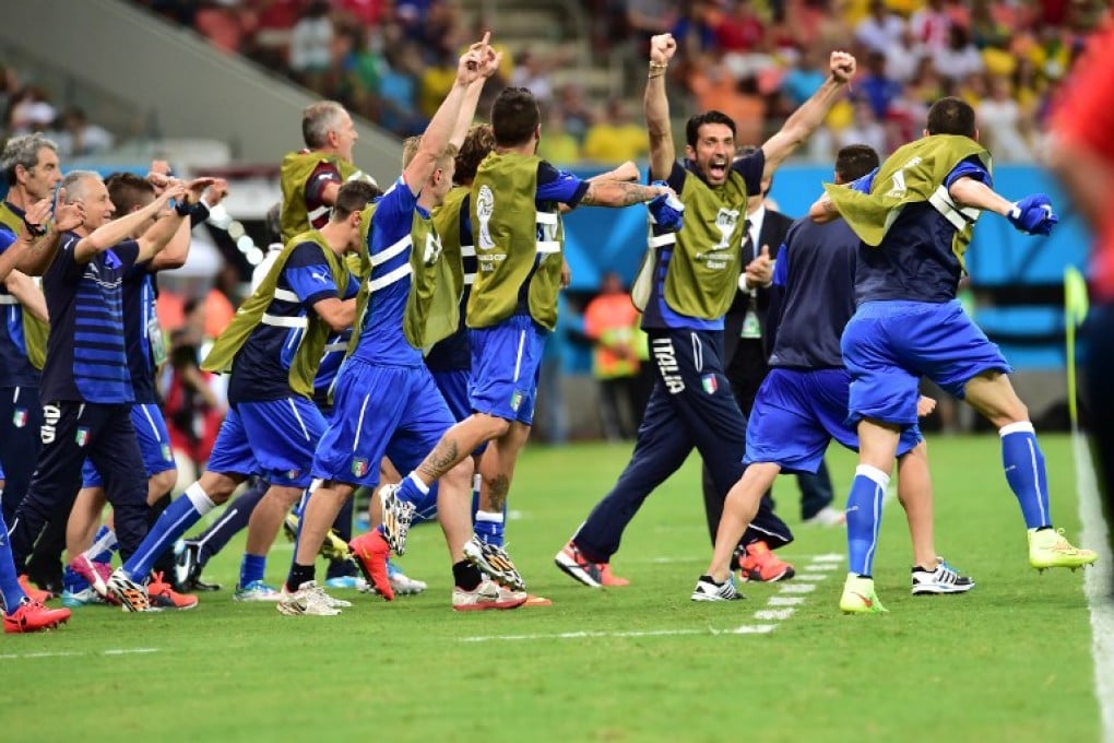 Italy celebrate the win. Photo: AFP