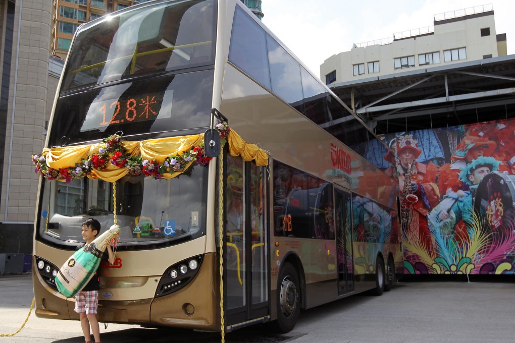 KMB's new 12.8-metre-long bus is unveiled. Photo: Edward Wong