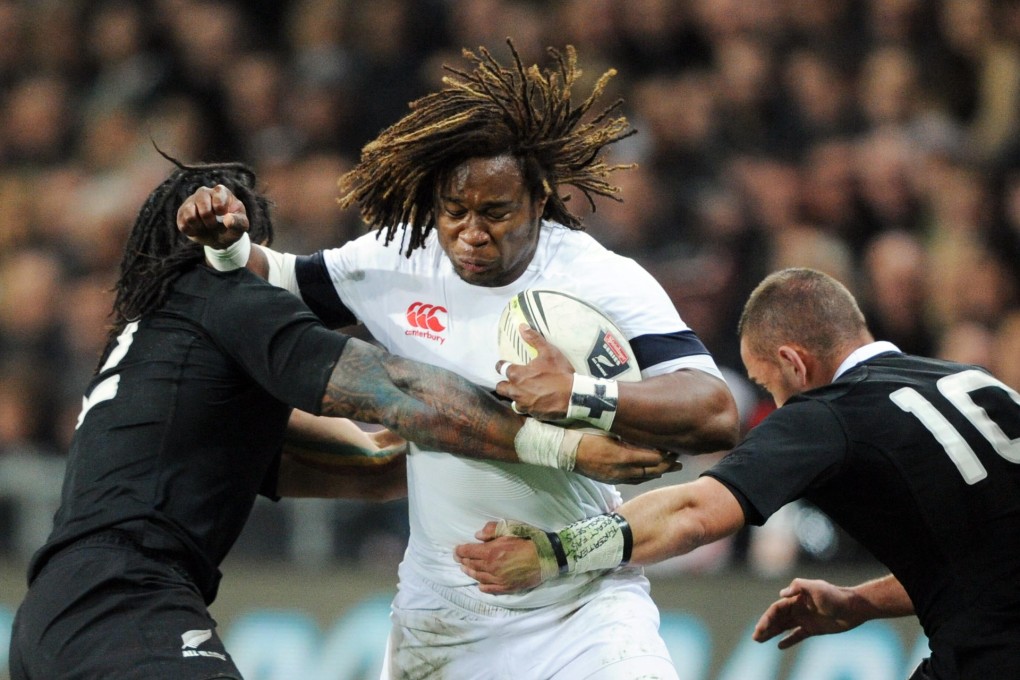 England's Marland Yarde tries to break out of the clutches of All Blacks' Ma'a Nonu and Aaron Cruden in the second test in Dunedin. Photo: AP