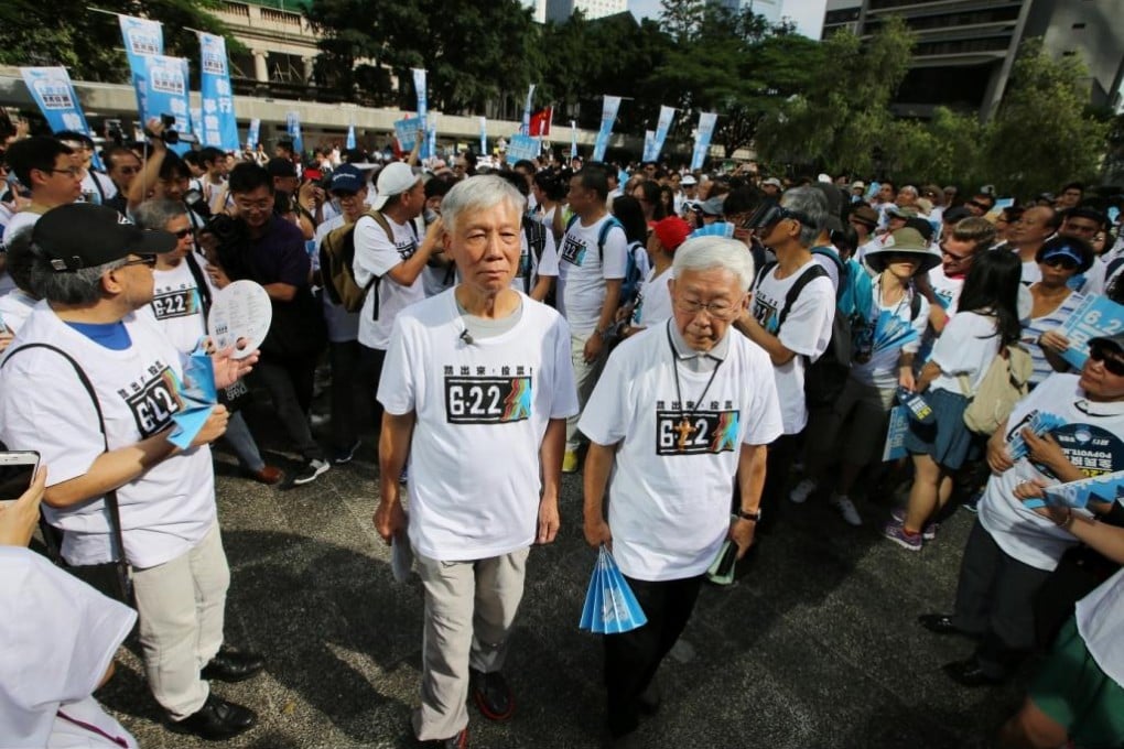 Cardinal Joseph Zen Ze-kiun (front right) and one of the Occupy Central founders Chu Yiu-ming (front left) attend a march from Central to Mei Foo, calling on Hongkongers to vote in an Occupy Central 'referendum' on June 22. Photo: Sam Tsang