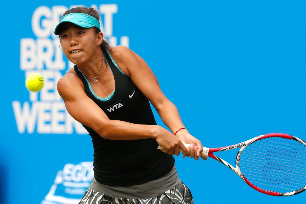 Shuai Zhang of China returns to Ana Ivanovic of Serbia during their semi-final match at the Birmingham Open. Photo: AFP