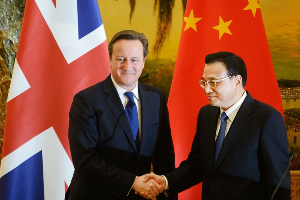 Britain's Prime Minister David Cameron (left) and Chinese Premier Li Keqiang meet in Beijing last December. Photo: EPA