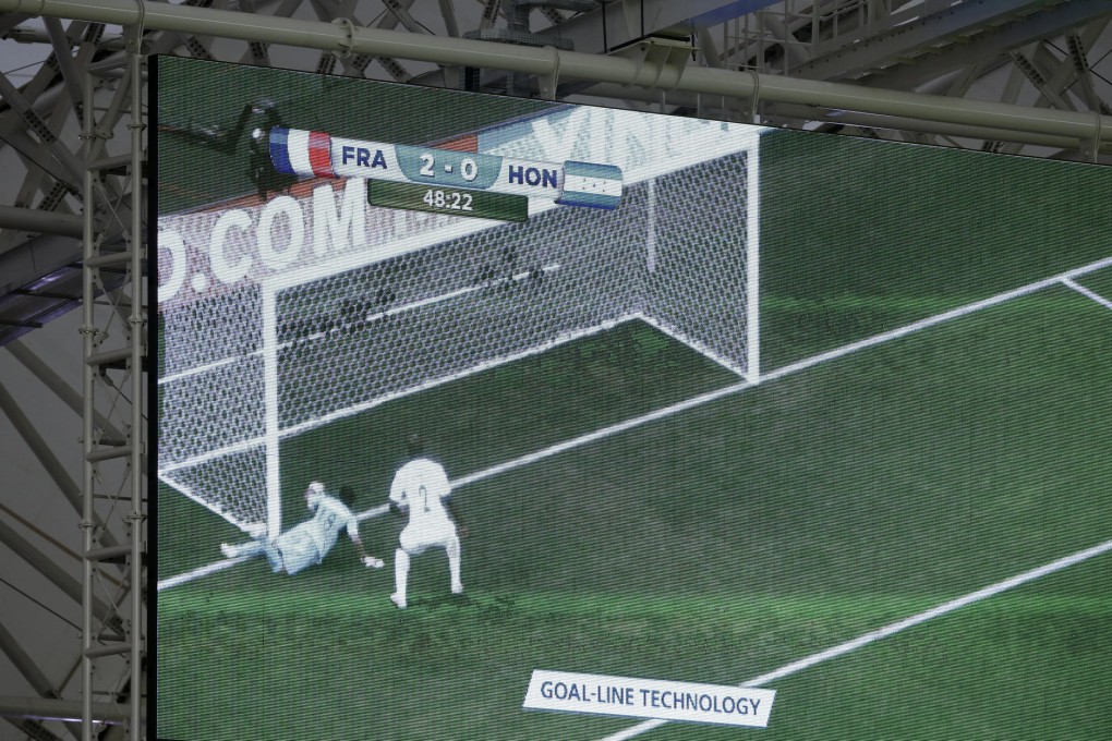 A video replay of Honduras goalkeeper Noel Valladares' own-goal against France is screened inside the Estadio Beira-Rio. Photo: AP