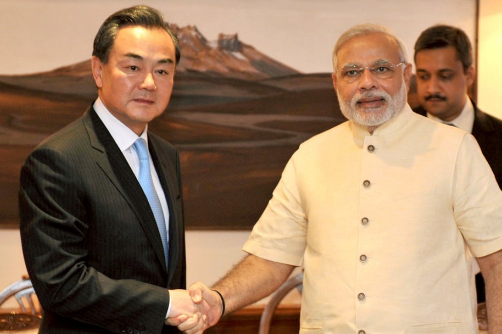 Wang Yi and Narendra Modi meet in New Delhi. Photo: AFP