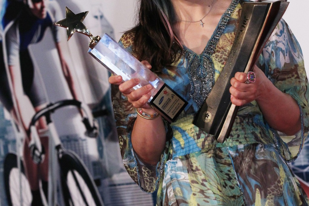 Sarah Lee Wai-sze poses with her double Hong Kong Sports Stars Awards in March. Photo: Nora Tam/ SCMP Pictures