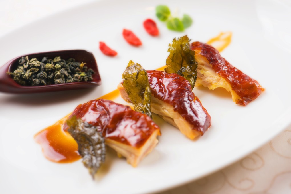 Signature tea-smoked crispy chicken at Wing Lei