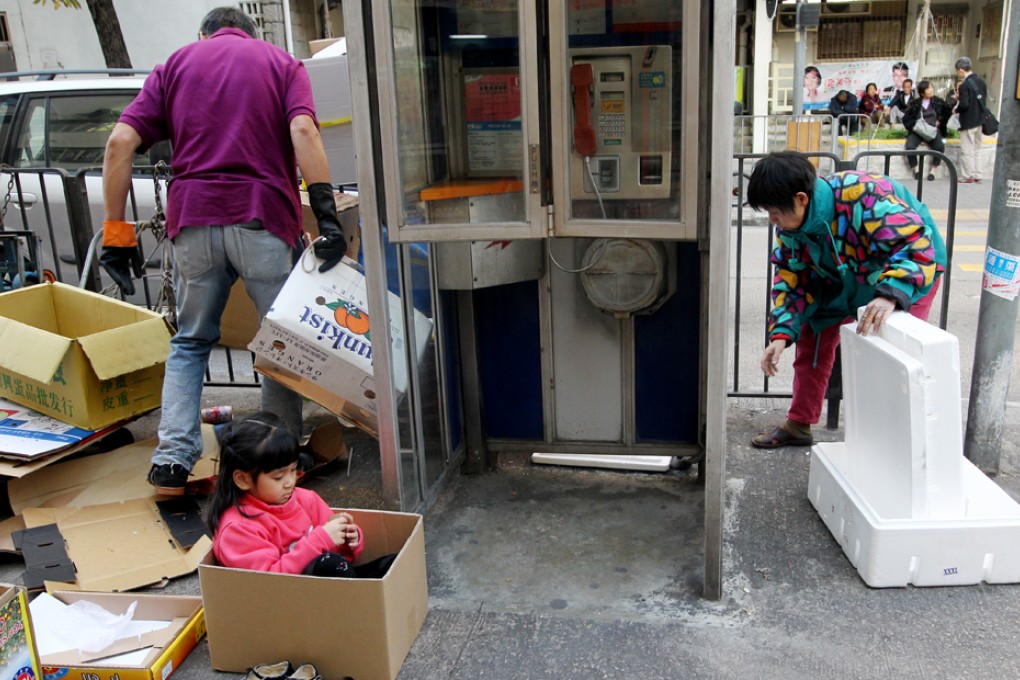 A family recycles in Sham Shui Po. Photo: Felix Wong