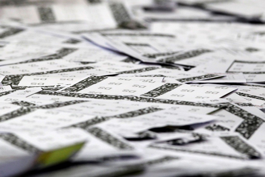 A survey finds 54 per cent of Hong Kong people want "one person, one vote" even if the candidate nomination process is not one they are happy with.