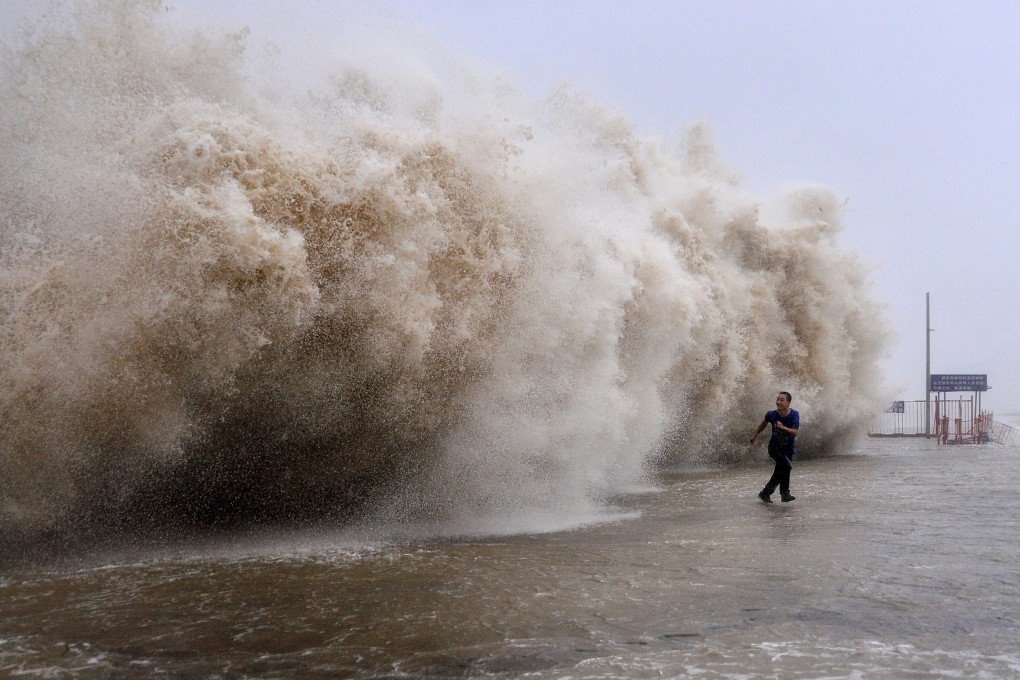 A typhoon in the Guangdong province last year caused huge waves and killed at least 25 people. Photo: AFP