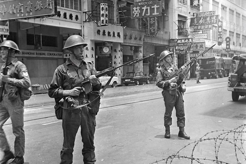 British soldiers patrol Queen’s Road Central, in 1967, after a bomb was found in the area. Photos: SCMP