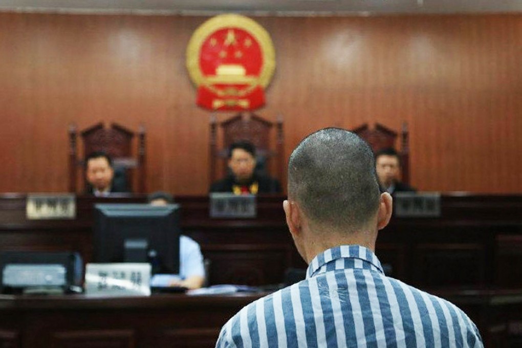 He Shenguo receiving his death sentence. Photo: SCMP Pictures