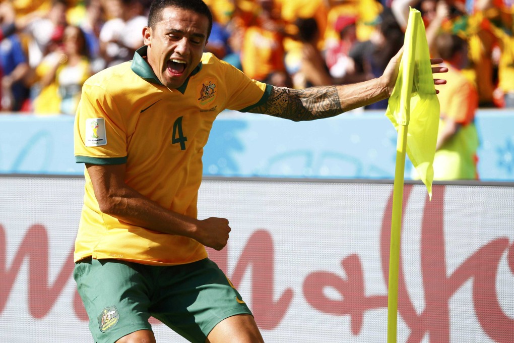 Australia's Tim Cahill celebrates after scoring against the Netherlands in Porto Alegre. Photo: Reuters
