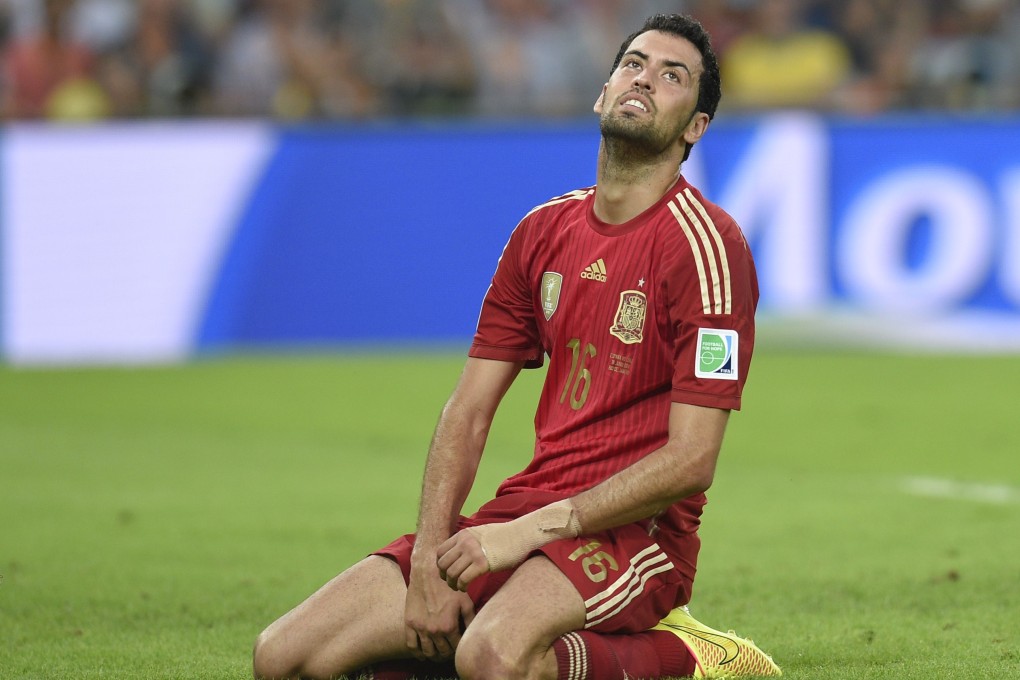 Sergio Busquets reacts to a missed chance. Photo: AFP