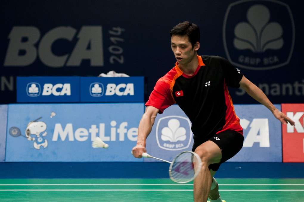 Hu Yun competes against Simon Santoso in round two of the BCA Indonesia Open in Jakarta. Photo: Xinhua