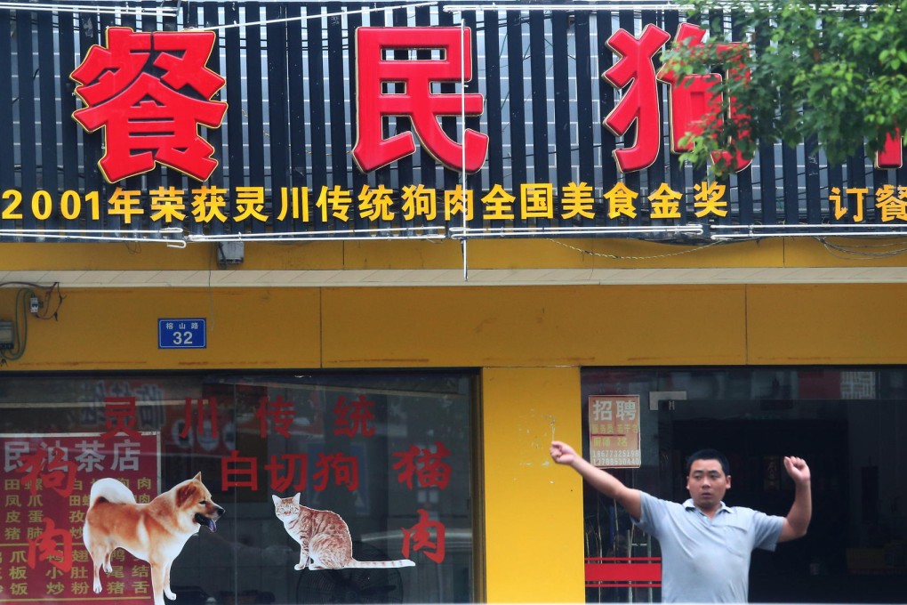 A restaurant in Guilin in Guangxi province touts "signature dog meat". The city is a hub for the trade. Photo: David Wong