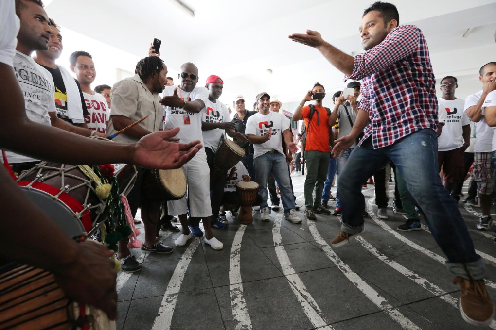 Protesters send a lively message at the ferry pier. Photo: Felix Wong