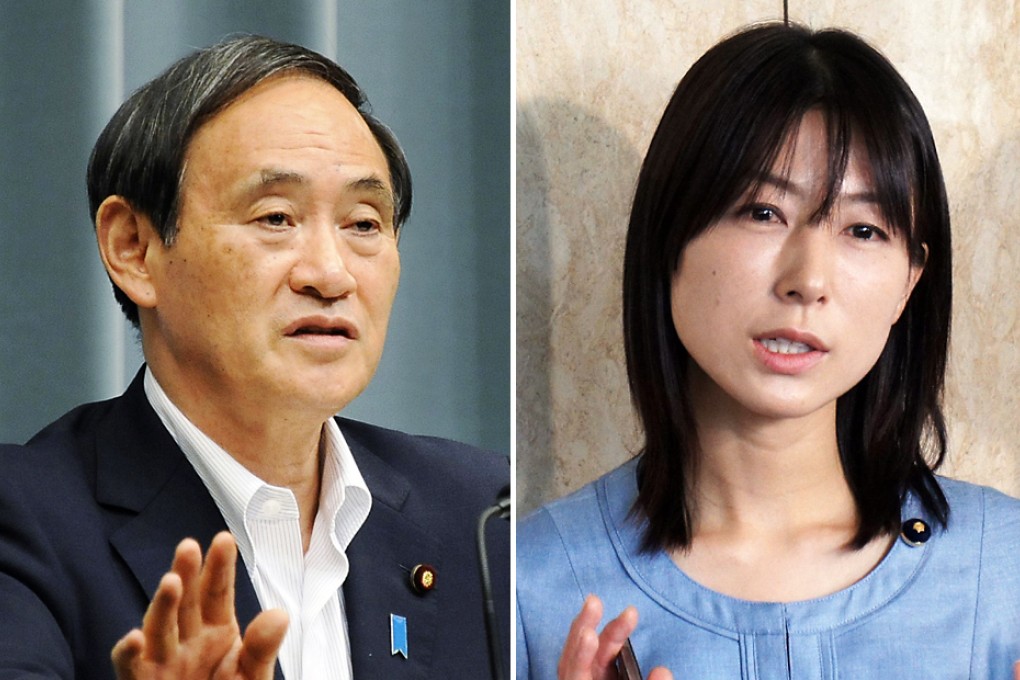 Chief Cabinet Secretary Yoshihide Suga and assemblywoman Ayaka Shiomura. Photos: AFP