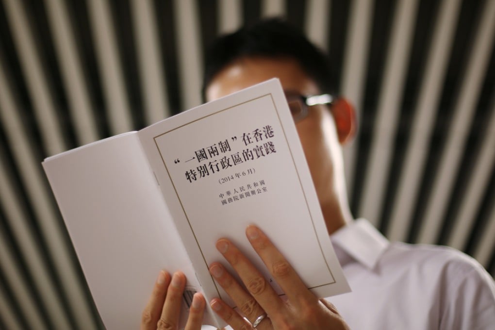 The "One-Country, Two-Systems" policy is available at bookstores. Photo: Nora Tam