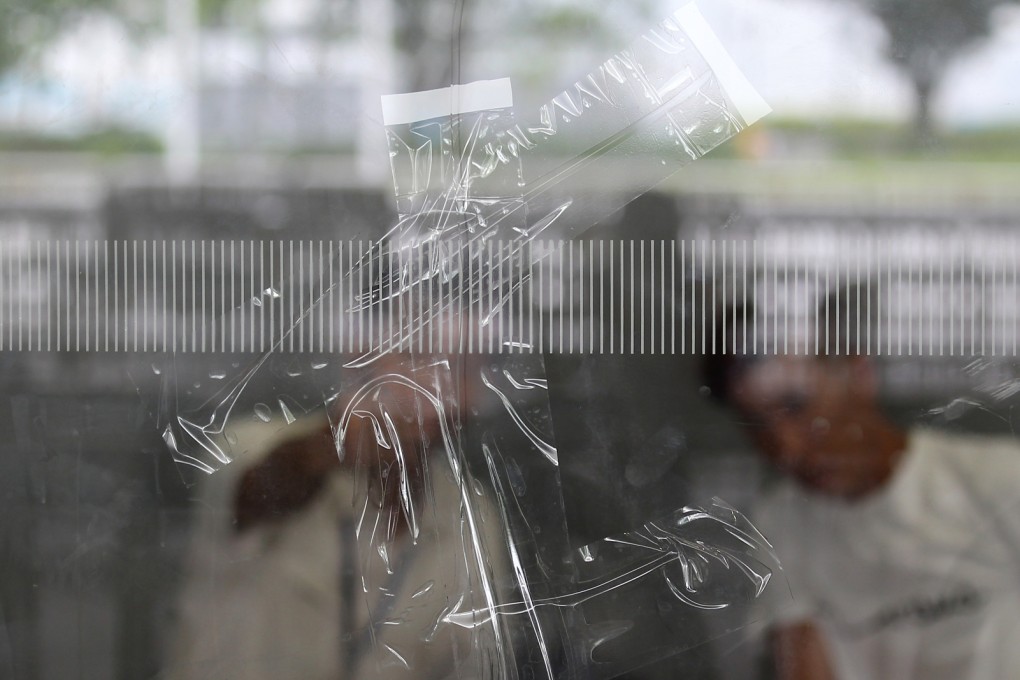A cracked glass at the entrance of the Legco building after protesters stormed it earlier this month. Photo: Jonathan Wong