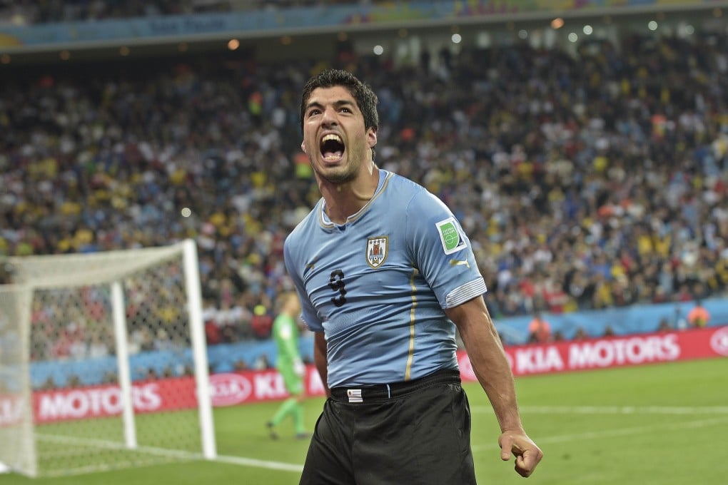 Dream come true: Luis Suarez celebrates his winner. Photo: AFP