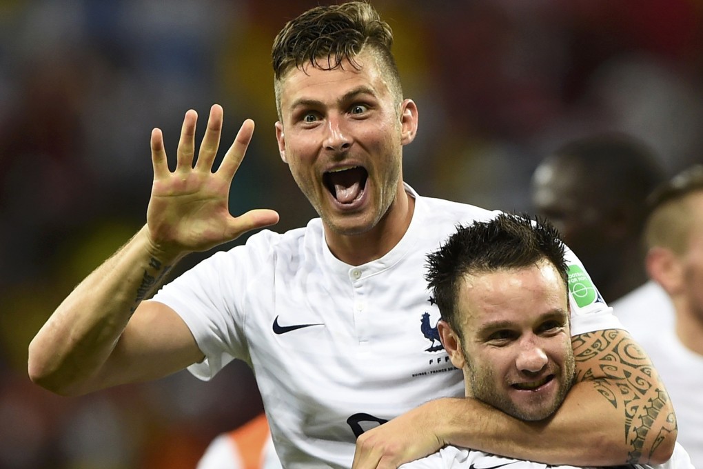 Mathieu Valbuena celebrates his goal against Switzerland with Olivier Giroud. Valbuena is the wee one. Photo: Reuters