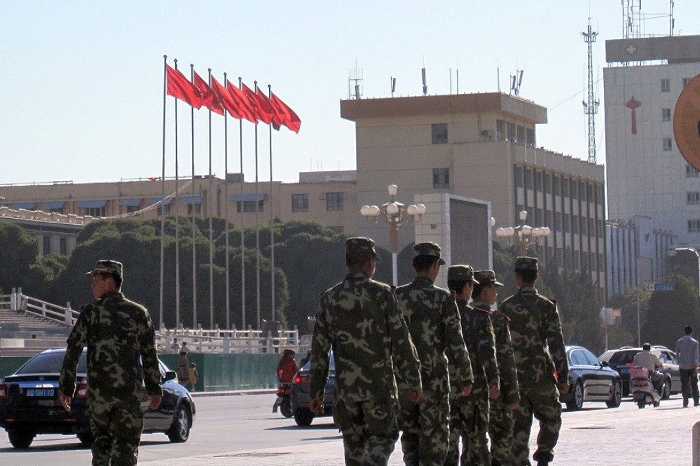 Security forces step up patrols in central Kashgar. Photo: AFP