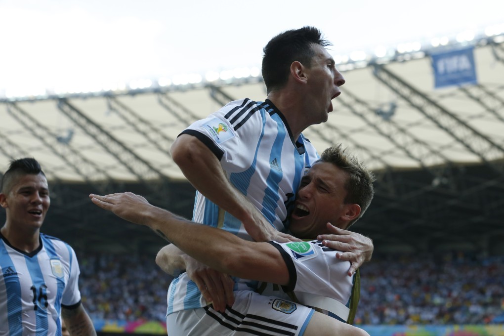 Lionel Messi celebrates his winner. Photo: AP